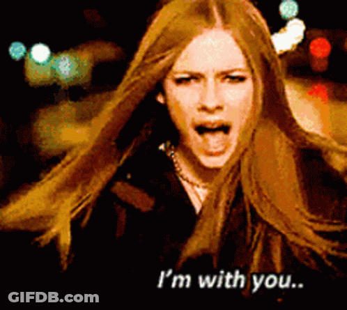 A Woman With Long Hair Is Screaming With The Words I 'M With You GIF