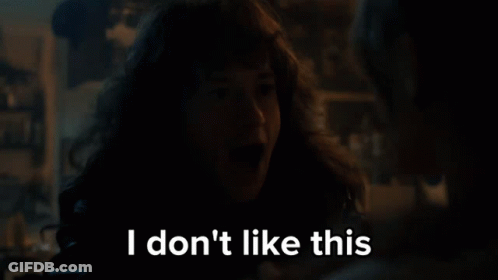 A Woman With Long Hair Says I Don 'T Like This In A Dark Room GIF