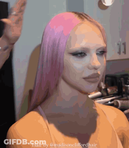 A Woman With Long Pink Hair Is Getting Her Hair Done By Madisoncliffordhair GIF