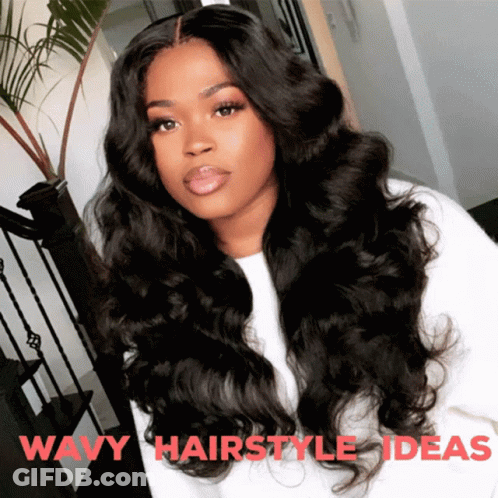 A Woman With Long Wavy Hair Is Wearing A White Shirt With The Words Wavy Hairstyle Ideas Above Her GIF