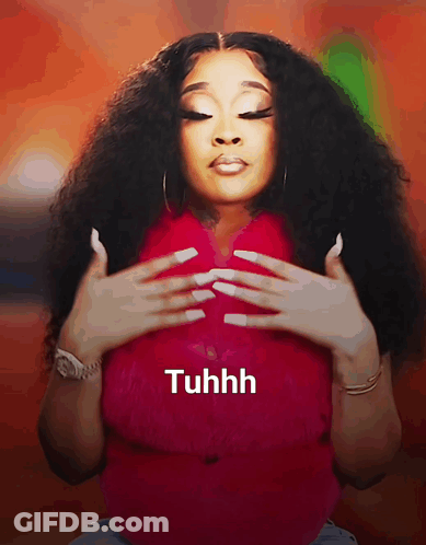 A Woman With Long White Nails Is Wearing A Red Shirt That Says Tuhhh On The Bottom GIF