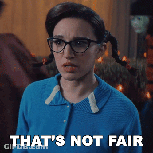 A Woman With Pigtails And Glasses Has The Words That 'S Not Fair Above Her GIF