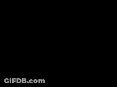 A Woman With Pink Hair Has A Pair Of White Ear Buds On Her Head GIF