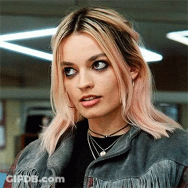 Woman With Pink Hair Wearing Fringed Jacket GIF