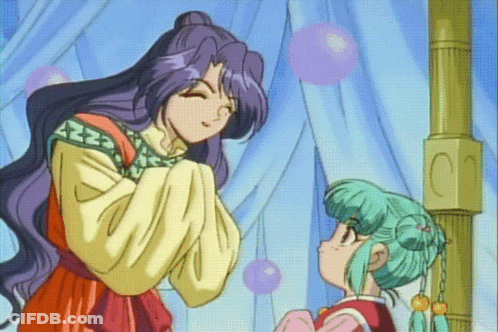 A Woman With Purple Hair And A Green Haired Girl Are Standing Next To Each Other GIF