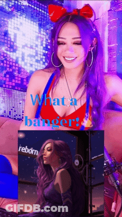 A Woman With Purple Hair And A Red Top With The Words What A Banger GIF