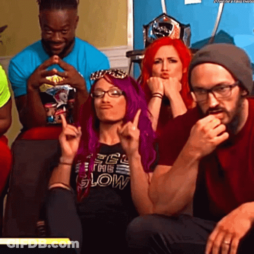 A Woman With Purple Hair And A Shirt That Says Feel The Glow GIF