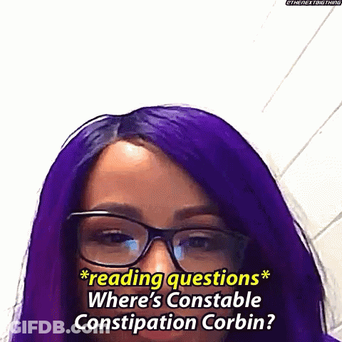 A Woman With Purple Hair And Glasses Is Asking Where 'S Constable Constipation Corbin . GIF