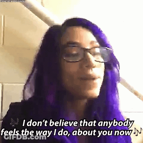 A Woman With Purple Hair And Glasses Is Saying I Don 'T Believe That Anybody Feels The Way I Do About You GIF