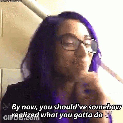 A Woman With Purple Hair And Glasses Says `` By Now , You Should Ve Somehow Realized What You Gotta Do '' . GIF