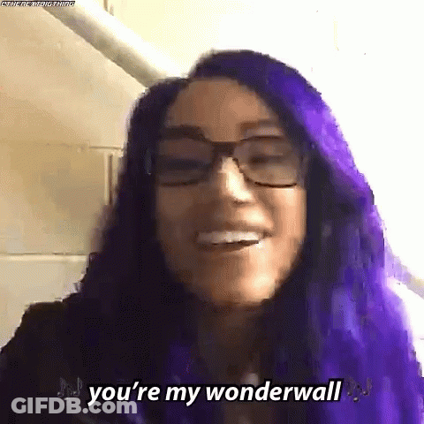 A Woman With Purple Hair And Glasses Says `` You 'Re My Wonderwall '' . GIF