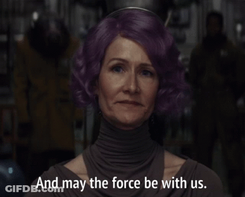 A Woman With Purple Hair Has The Words And May The Force Be With Us Below Her GIF