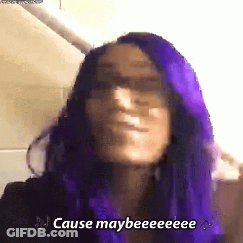 A Woman With Purple Hair Is Making A Funny Face And Says Cause Maybeeeee . GIF