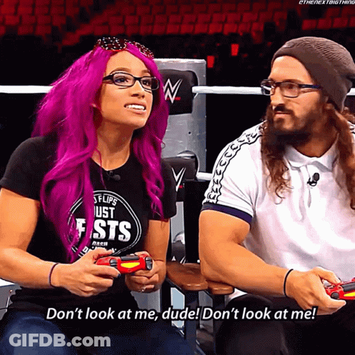 A Woman With Purple Hair Is Playing A Video Game While A Man Says Don 'T Look At Me Dude GIF