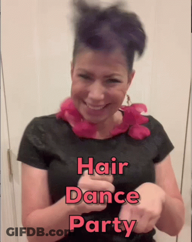 A Woman With Purple Hair Is Smiling And Wearing A Black Shirt That Says " Hair Dance Party " On It GIF