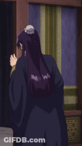 Woman With Purple Hair Standing By Window GIF