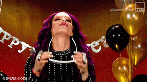 A Woman With Purple Hair Is Standing In Front Of Balloons With A Banner That Says Happy GIF