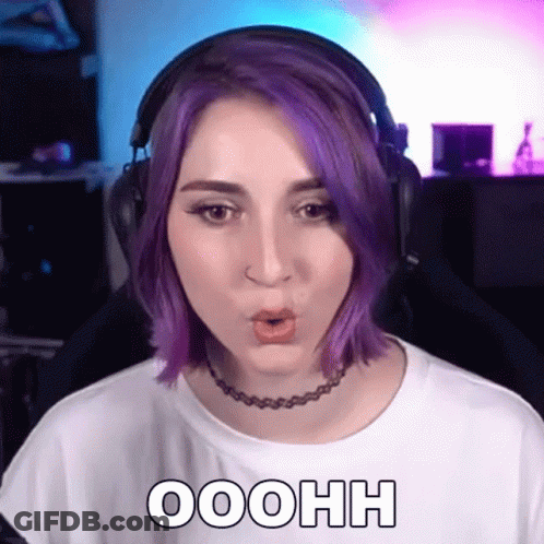 A Woman With Purple Hair Is Wearing Headphones And A Choker And Says Ooohh GIF