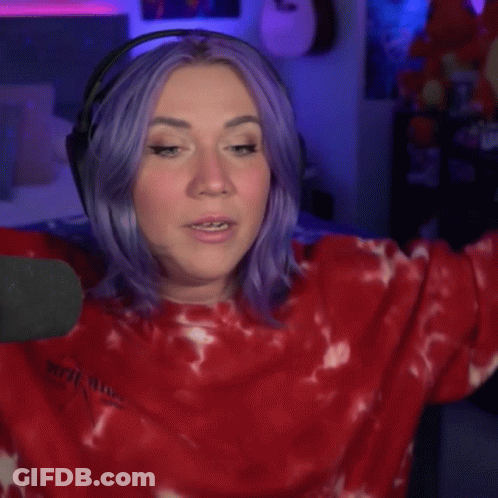 A Woman With Purple Hair Is Wearing Headphones And Says " You Are My Hero " GIF