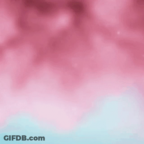 A Woman With Purple Hair Is Wearing Pink Hoop Earrings And A Pink Braided Ponytail . GIF