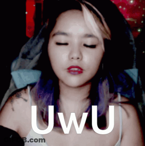 A Woman With Purple Hair Says Uwu In Front Of Her GIF