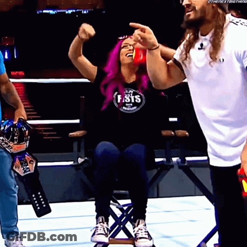 A Woman With Purple Hair Wearing A Shirt That Says Fist GIF