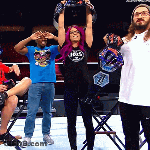 A Woman With Purple Hair Wearing A Shirt That Says The Fist 'S GIF