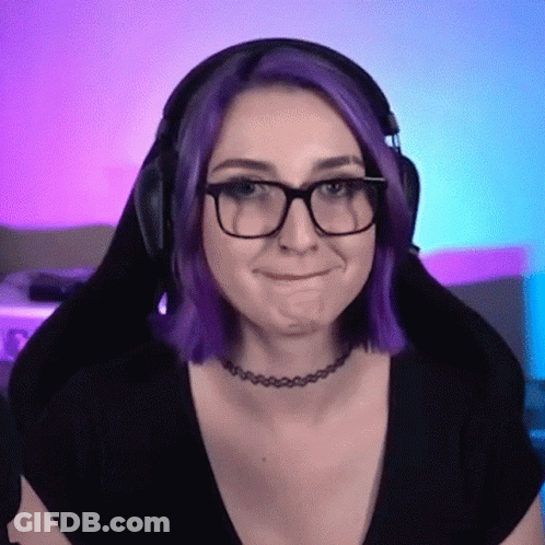 A Woman With Purple Hair Wearing Glasses And A Choker GIF