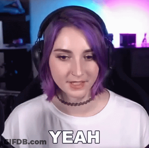 A Woman With Purple Hair Wearing Headphones And A Choker Says Yeah GIF