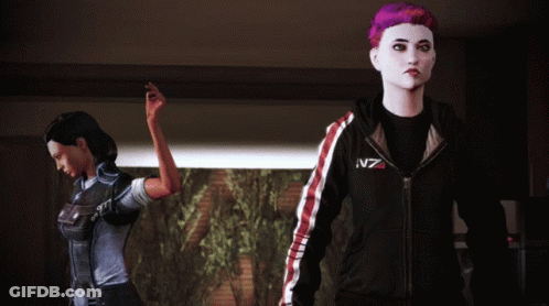 A Woman With Purple Hair Wears A Black N7 Sweatshirt GIF