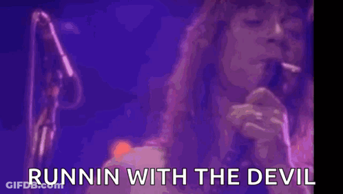 A Woman With Purple Smoke Coming Out Of Her Mouth With The Words Runnin With The Devil Written Below Her GIF