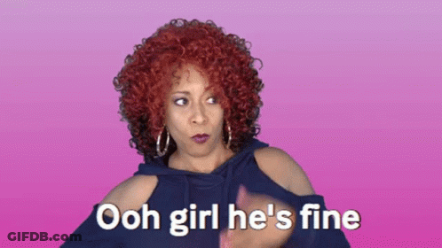 A Woman With Red Curly Hair Says " Ooh Girl He 'S Fine " GIF