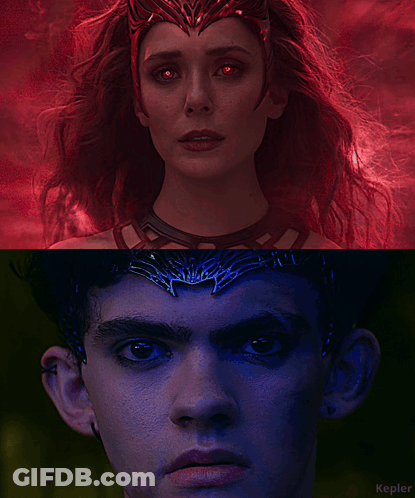 A Woman With Red Eyes And A Man With Blue Eyes GIF