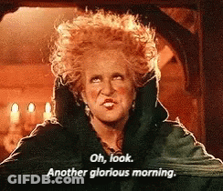 A Woman With Red Hair And A Black Coat Says Oh Look Another Glorious Morning GIF