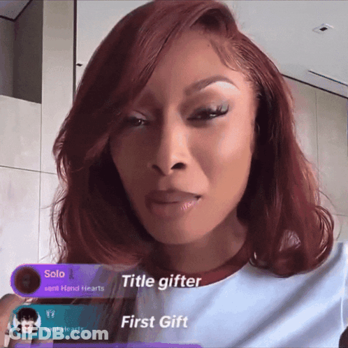 A Woman With Red Hair And A Purple Banner That Says Title Gifter GIF