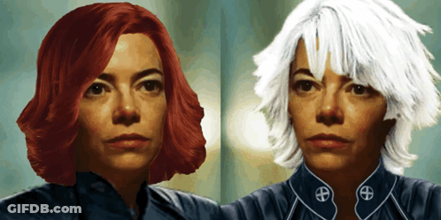 A Woman With Red Hair And A White Haired Woman GIF