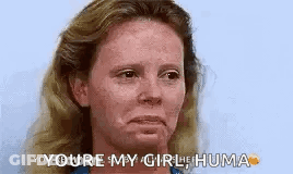 A Woman With Red Hair And Freckles Is Making A Funny Face And Says `` You 'Re My Girl ! '' GIF