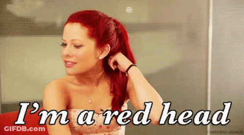 A Woman With Red Hair Has The Words I 'M A Red Head Above Her GIF