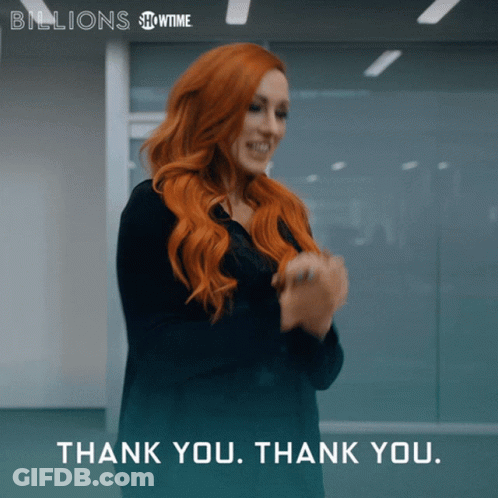 A Woman With Red Hair Is Clapping Her Hands With The Words Thank You Thank You Below Her GIF