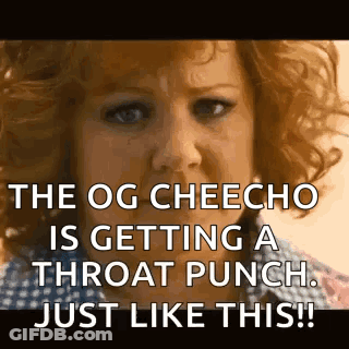 A Woman With Red Hair Is Getting A Throat Punch Just Like This . GIF