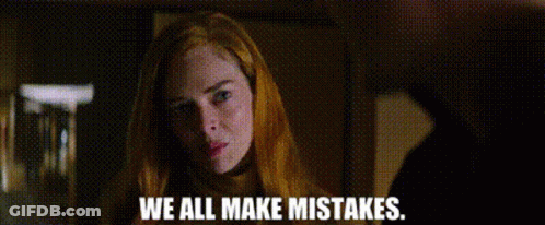 A Woman With Red Hair Is Looking At The Camera With The Words `` We All Make Mistakes '' Written Below Her . GIF