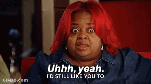 A Woman With Red Hair Is Making A Funny Face And Says Uhh Yeah I 'D Still Like You To . GIF