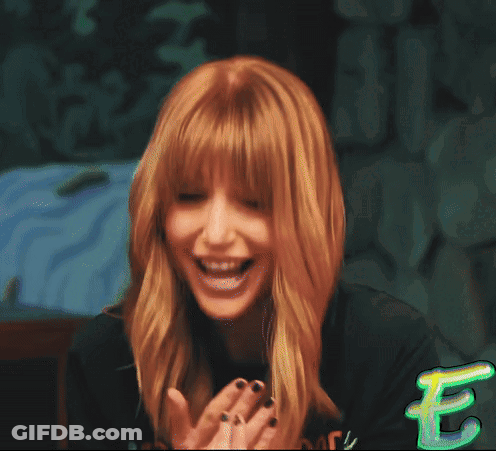 A Woman With Red Hair Is Making A Funny Face With The Word Ex Written In Green GIF