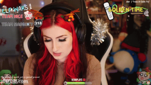 A Woman With Red Hair Is Sitting In A Chair With Headphones On And The Words Golden Time On The Screen GIF
