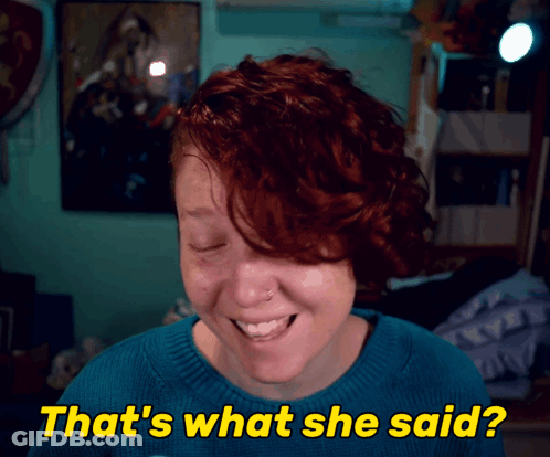 A Woman With Red Hair Is Smiling With The Words That 'S What She Said Below Her GIF