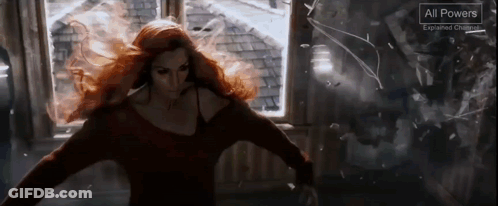 A Woman With Red Hair Is Standing In Front Of A Window With A Sign That Says All Powers GIF