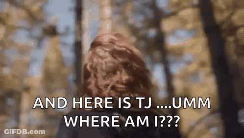 A Woman With Red Hair Is Standing In The Woods And Says And Here Is Tj ... Umm Where Am I ?? GIF