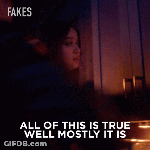 A Woman With Red Hair Says All Of This Is True Well Mostly It Is In A Dark Room GIF
