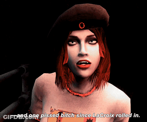 A Woman With Red Hair Says " And One Pissed Bitch Since Lacroix Rolled In " In A Dark Room GIF