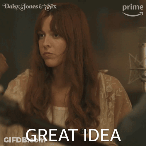 A Woman With Red Hair Says " Great Idea " In Front Of A Daisy Jones And The Six Logo GIF